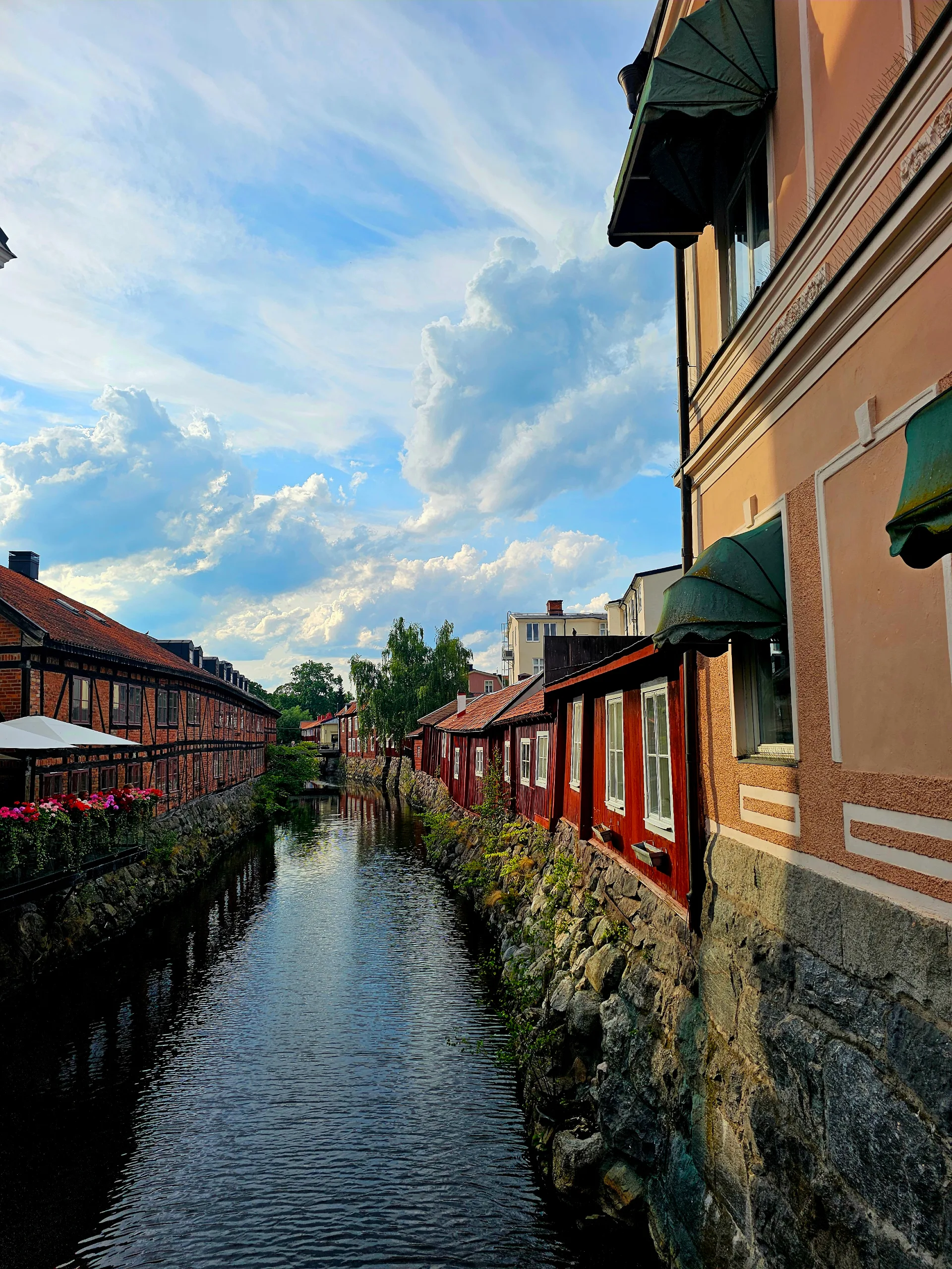 View from Västerås. A stream lined with old wooden houses